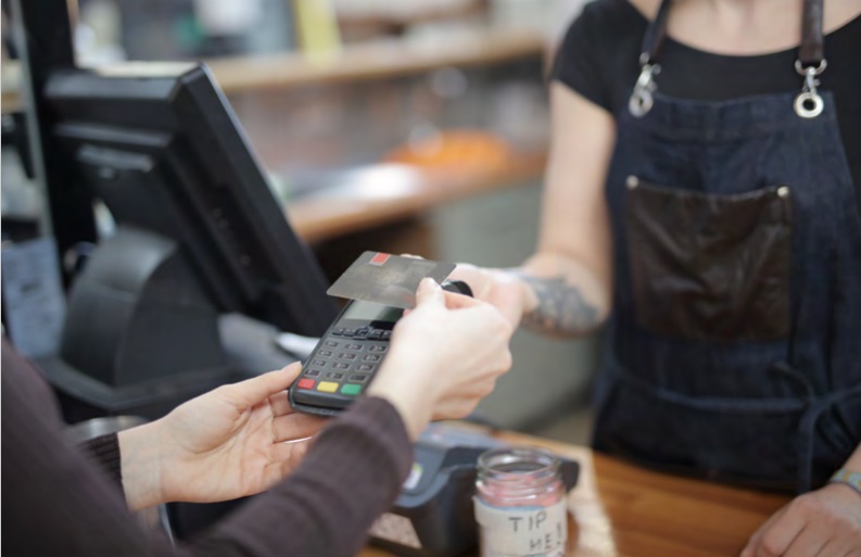 Credit card at a store checkout counter