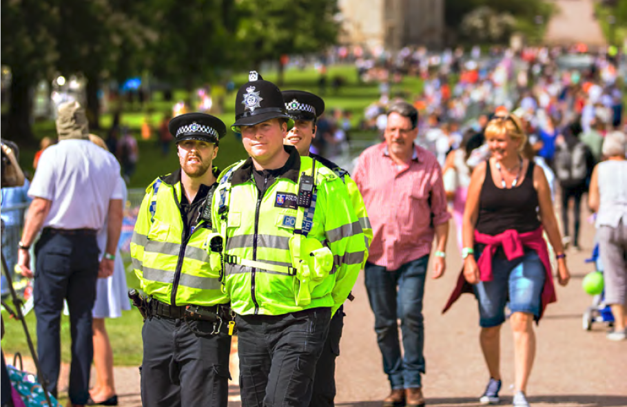 Police officers stand