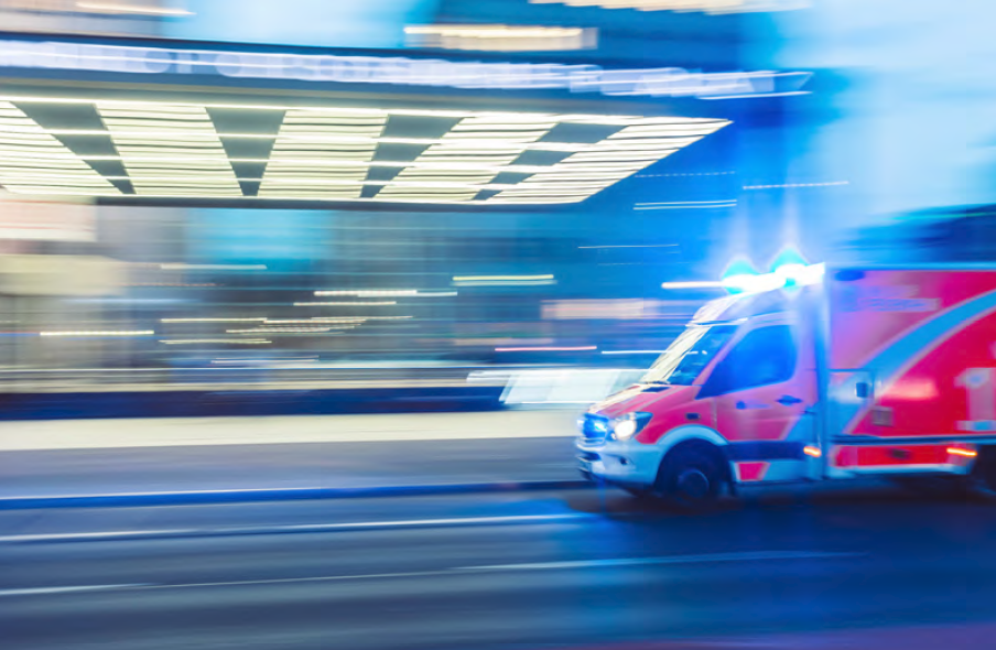 Ambulance in motion at night